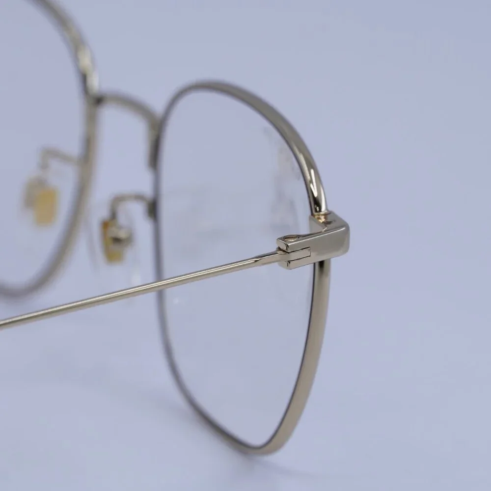 Gucci GG0681S 001 Sunglasses Gold Square Frame, Clear Photochromic Lenses